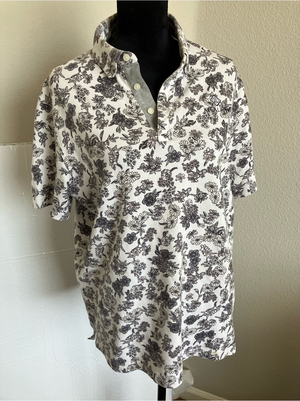 Nike Men's White Polo with Black Floral Print